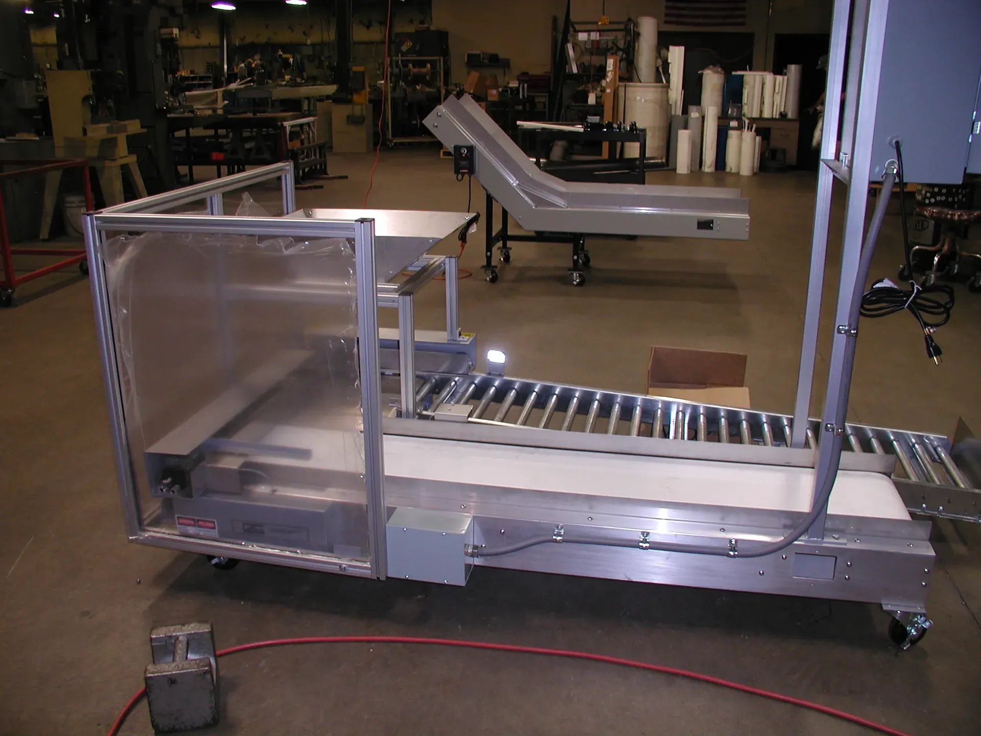 LaRos aluminum conveyor with clear guarding, built 2026
